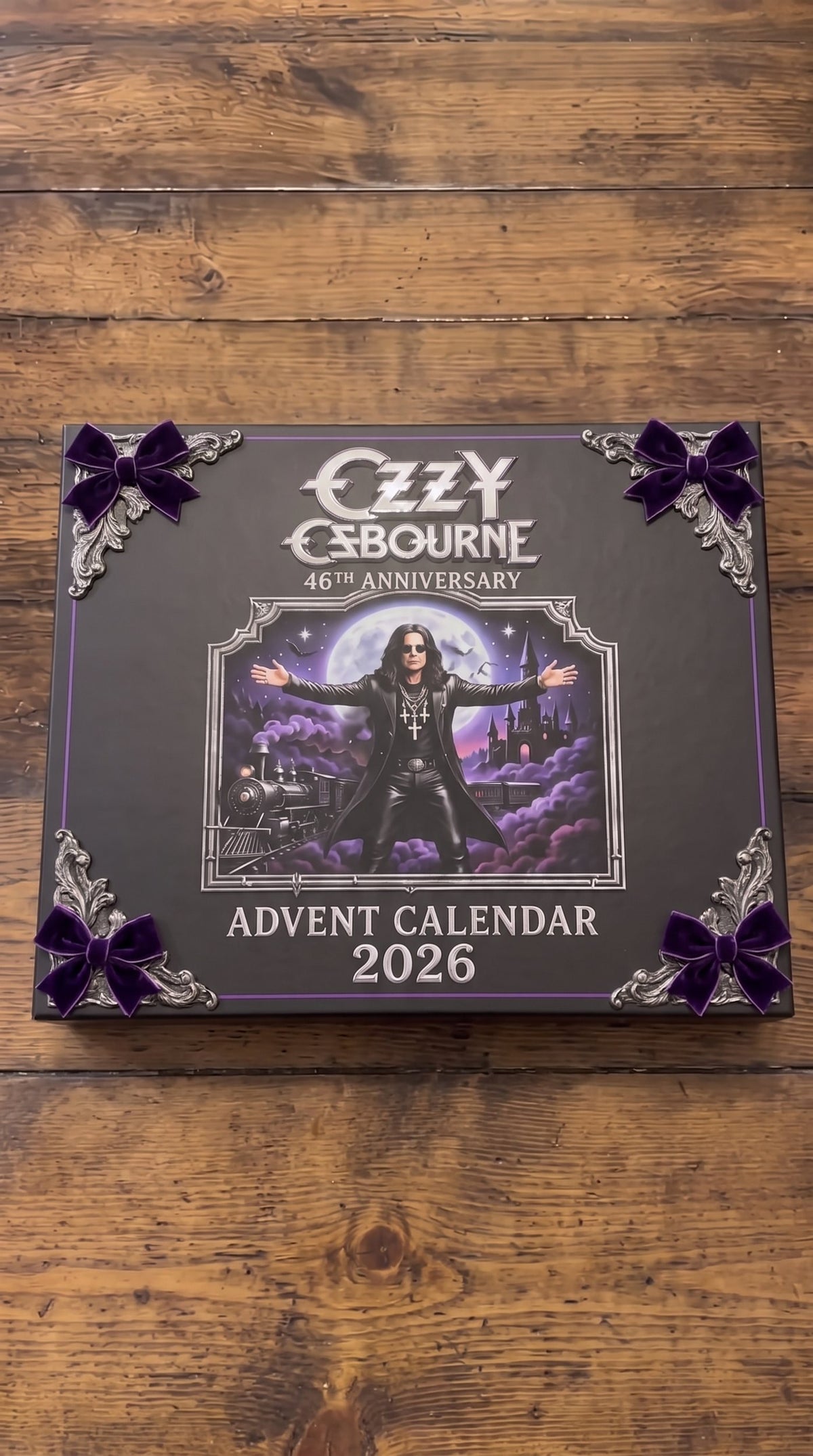Black advent calendar box with purple velvet bows